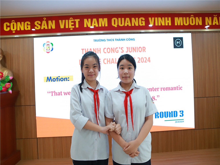 A couple of girls in uniform

Description automatically generated