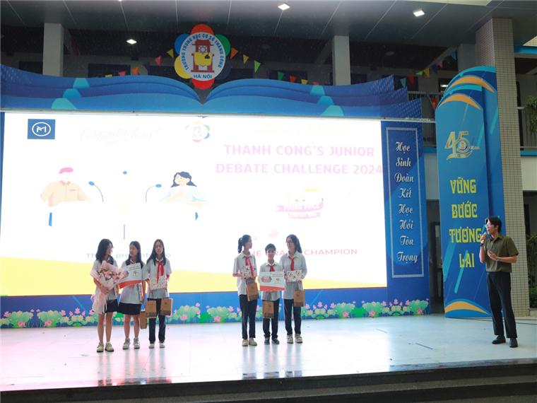 A group of young girls on stage

Description automatically generated